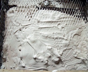 Plaster applied over steel mesh