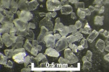 Photo micrograph of dolomite sample showing its angular, cuboid particles