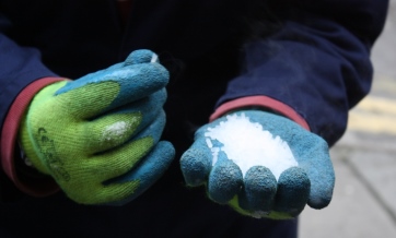 Close-up of a handful of dry ice pellets