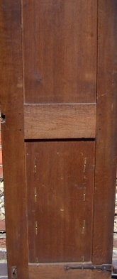Interior face of flush, panel-in-frame door