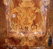 Damaged marquetry and veneer decoration
