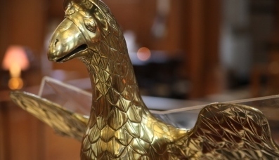 Detail of naively rendered brass eagle's head