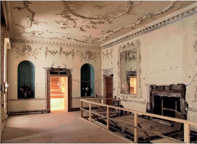 Badly deteriorated historic interior with fine plasterwork to walls and ceiling