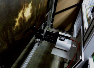 A painting being scanned