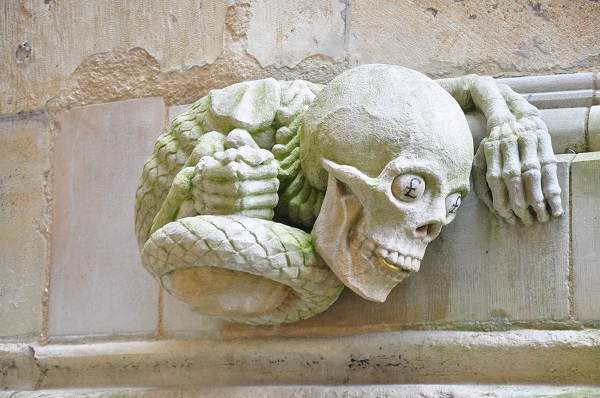 A 2011 sculpture on the south transept warning against the sin of greed 