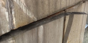 A detailed photo of a ribbon anode installation