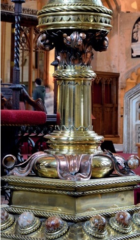 Highly detailed lectern base with ropework trim and polished stones in mounts
