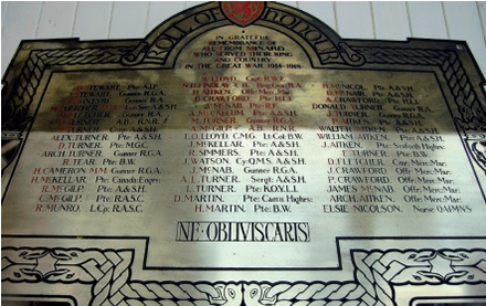 Roll of Honour plaque with lower half cleaned