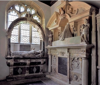 Monuments to Anne Lake and, beneath arched leaded light window, Sir George Rodney. 