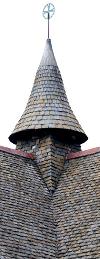 Welsh slate roof with conical slated fleche at roof junction