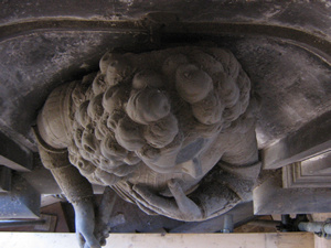 Top-down view of a badly soiled church monument