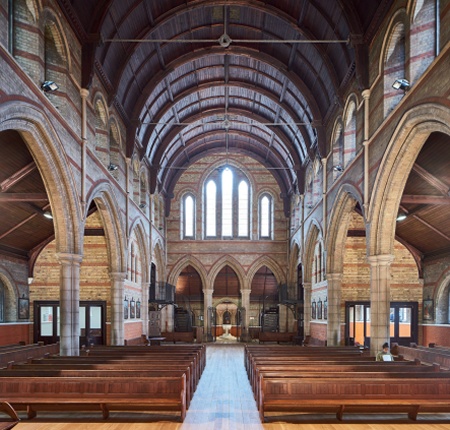 View through the nave towards the narthex after the completion of the project