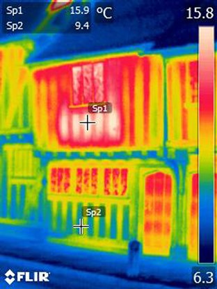Thermal image showing heat loss from the facade of a timber framed building