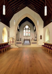 Nave with pews removed and movable seating lining the walls