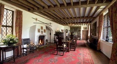 Historic interior with exposed beam and joist ceiling