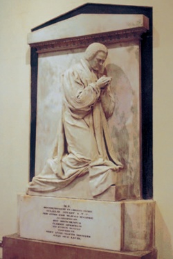 The Stuart monument, which depicts the archbishop kneeling at prayer atop an inscribed plinth and backed by a representation of the end of a sarcophagus complete with pitched lid