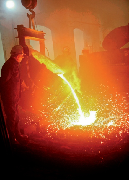Molten iron is poured into a mould