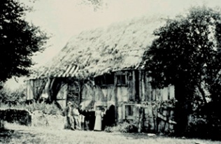 B & W photograph of the dilapidated clergy house