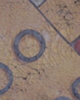 Detail of Kirklington hatchment showing crazing of fine cracks to paint surface