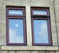 Pair of uPVC windows in historic setting