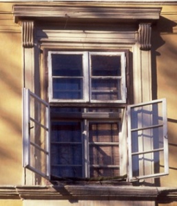 Well-spaced double casement windows in historic facade