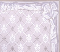 Detail of the reproduction Trellis and Ribbon Border paper for Uppark (in shades of lilac and white)