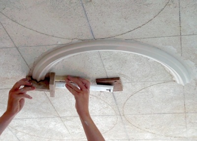 A semi-circular rib is added to a marked-up ceiling