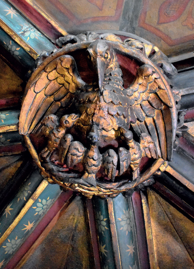 A gilded boss in the chancel during cleaning to remove the yellowed varnish