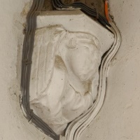 Stylised angel with multiple electrical cables following its contours on both sides