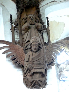 Wooden angel with pan pipes