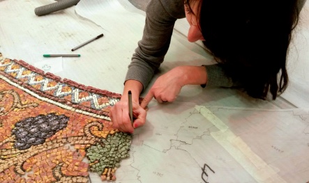 The author maps an area of mosaic on a large sheet of annotated tracing paper