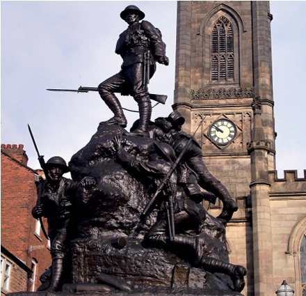 Bronze sculptural group depicting four WWI British infantrymen