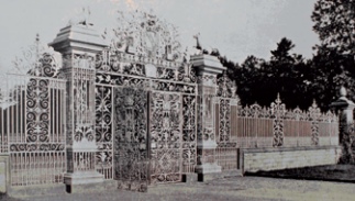 B/w photo of the elaborate cast iron gates to Chirk Castle, Wales