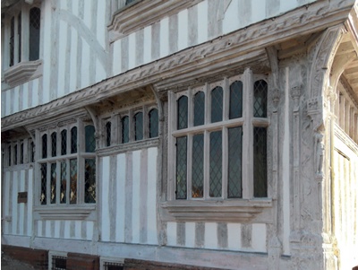 Historic timber-frame building with limewashed finish to external timberwork