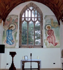 Pair of wall paintings either side of chancel east window depicting the Annunciation