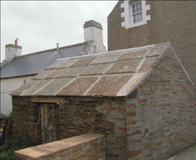 The renewed patent slated roof of a house in Stromness