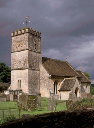 A rural church with storm clouds gathering in the background