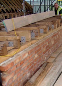 New parapet and rafter construction