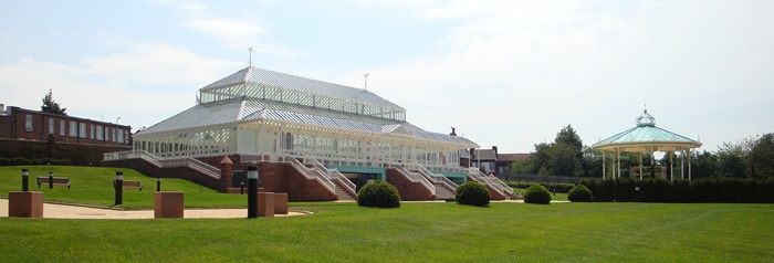 The restored conservatory and bandstand and surrounding landscaping