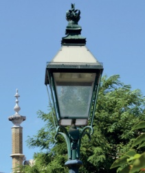 Historic cast iron street lamp with crown finial