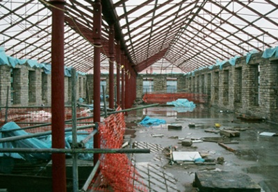 Cast iron columns and exposed roof elements during works to convert a Victorian textile mill