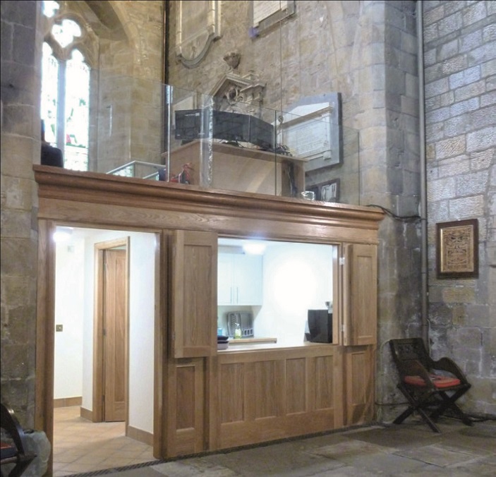 A tea servery infilling the base of St Wilfred's bell tower.
