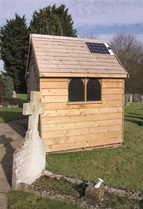 Wooden composting toilet in a churchyard.