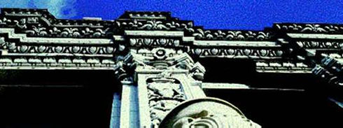 Detail of richly ornamented frieze in white terracotta