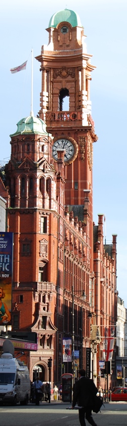 The ornate red tower of terracotta rising over Oxford Road