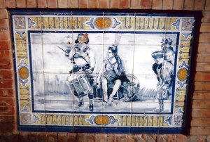 Tile panel depicting drummer boy and other figures