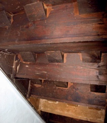 Underside of repaired timber staircase