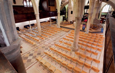 Church interior with temporary seating in nave