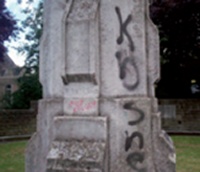 Graffiti on stone memorial