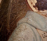 Detail of reredos showing paint blistering